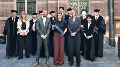 Lisa  defending her PhD thesis